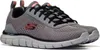 A pair of gray Skechers athletic shoes with black laces and orange accents. Voir les images du produit