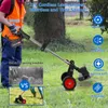 A person is using a cordless lawn mower in a grassy outdoor setting. Produktbild-Vorschau