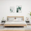 A bedroom scene with a bed and two nightstands. Produktbild-Vorschau