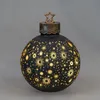 A decorative Christmas ornament with LED lights. Produktbild-Vorschau