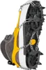 A close-up view of a hiking boot with crampons attached to the sole. Produktbild-Vorschau