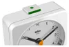 Close-up of the top part of a white Braun alarm clock. Podgląd zdjęcia produktu