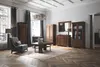 A well-furnished living room with wooden furniture, a rug, and a chandelier. Produktbild-Vorschau