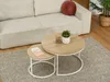 A living room scene with a couch, coffee tables, and a rug. Podgląd zdjęcia produktu