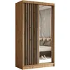 A wardrobe with sliding doors, one of which is a mirror, reflecting a bedroom interior. The wardrobe has a wooden finish and slatted detailing on one door. Produktbild-Vorschau