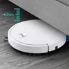 A white robot vacuum cleaner is shown cleaning under a piece of furniture, with a measurement graphic indicating its low profile. Náhled obrázku produktu