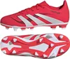 A pair of red Adidas Predator Club FG/MG J soccer cleats for children, shown from the side and underneath. Produktbild-Vorschau