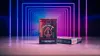A deck of Bicycle playing cards with a cyberpunk theme, set against a backdrop of neon blue and purple geometric lines. Voir les images du produit