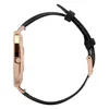 Side view of a smartwatch with a black leather strap and a gold-toned case. Podgląd zdjęcia produktu