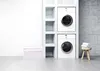 A laundry room scene with stacked washing machines and shelves. Voir les images du produit