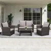 An outdoor furniture set on a patio. Produktbild-Vorschau