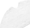 A close-up view of a white quilted fabric pad. Produktbild-Vorschau