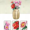 A collage showing a vase of flowers made of building blocks, with close-up views of individual flowers. Produktbild-Vorschau