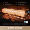 Close-up of a cleaning roller with glowing heating elements and text overlays highlighting its features. Produktbild-Vorschau