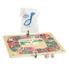 A board game with duck-shaped playing pieces and dice, along with a drawstring bag featuring a duck logo. Anteprima dell’immagine prodotto