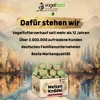 A box of bird food (meisenknödel) is shown in front of a scenic background of a lake and trees. Produktbild-Vorschau