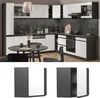 A modern kitchen with white and anthracite cabinets, a sink, a stove, and a dining table with chairs. Náhled obrázku produktu