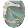 A toilet seat with a leaf pattern. Náhled obrázku produktu