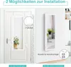 A collage showing two installation options for a white jewelry cabinet: hanging on a door and mounting on a wall. Produktbild-Vorschau