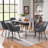 A dining room scene with a table and chairs set up for a meal. Produktbild-Vorschau