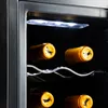 Close-up of wine bottles in a wine cooler. Voir les images du produit