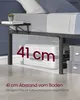 Underneath a bed frame, showing storage space with luggage and boxes. Produktbild-Vorschau