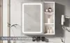 A modern bathroom cabinet with an illuminated mirror and open shelves, displaying toiletries and accessories. Voir les images du produit