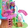 A toy playset featuring a treehouse with dolls and accessories. Anteprima dell’immagine prodotto