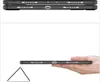 A hand holding a tablet case with a stand attached. Produktbild-Vorschau