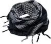 A black and white patterned scarf, folded and arranged in a circular shape. Anteprima dell’immagine prodotto
