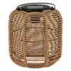 A solar lantern with a rattan-like woven exterior and a clear glass interior, set against a white background. Anteprima dell’immagine prodotto