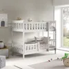 A white wooden bunk bed with bedding and pillows in a child's room, with a window in the background. Produktbild-Vorschau