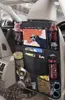 A car's back seat organizer filled with various items for children. Produktbild-Vorschau