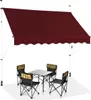 A burgundy awning is set up over a small table and four chairs, suggesting an outdoor seating area. Anteprima dell’immagine prodotto