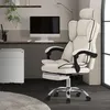 An office chair is shown in a home office setting with a desk, computer, and filing cabinet. Produktbild-Vorschau