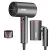A studio shot of a gray hairdryer with pink accents, along with two attachments, against a white background. Produktbild-Vorschau