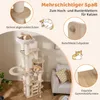A multi-level cat tree with various platforms, perches, and a hideaway, shown in a living room setting with decorative elements. Anteprima dell’immagine prodotto