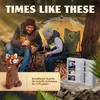 A father and son are camping and carving wood. Produktbild-Vorschau