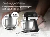 A black stand mixer with a silver bowl is shown on a surface dusted with flour, with hands in the background kneading dough. Produktbild-Vorschau
