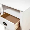 Close-up of an open drawer and a shelf on a white wooden desk. Náhľad obrázku produktu