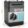 A product shot of a black and silver electronic piggy bank with a keypad and coin slot. Náhled obrázku produktu