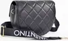 A black quilted handbag with a branded strap is shown against a white background. Anteprima dell’immagine prodotto