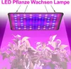 A grow light illuminates plants from above, casting a purple glow. Produktbild-Vorschau