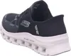 A side view of a black Skechers shoe with a white sole. Voir les images du produit