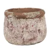 A close-up studio shot of a single, weathered terracotta pot with a pinkish hue and a textured, cracked surface. Voir les images du produit