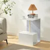 A modern side table with a cat scratching post integrated into its design, placed next to a sofa in a living room. Produktbild-Vorschau