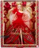 A Barbie doll in a red dress, presented in its holiday-themed packaging. Náhled obrázku produktu