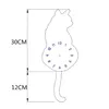 A line drawing of a cat-shaped clock with dimensions indicated. Produktbild-Vorschau
