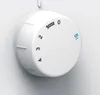 A close-up view of a white rotary dial with markings and numbers. Produktbild-Vorschau
