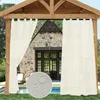 Outdoor curtains hanging from a wooden pergola in front of a stone house and pool. Produktbild-Vorschau